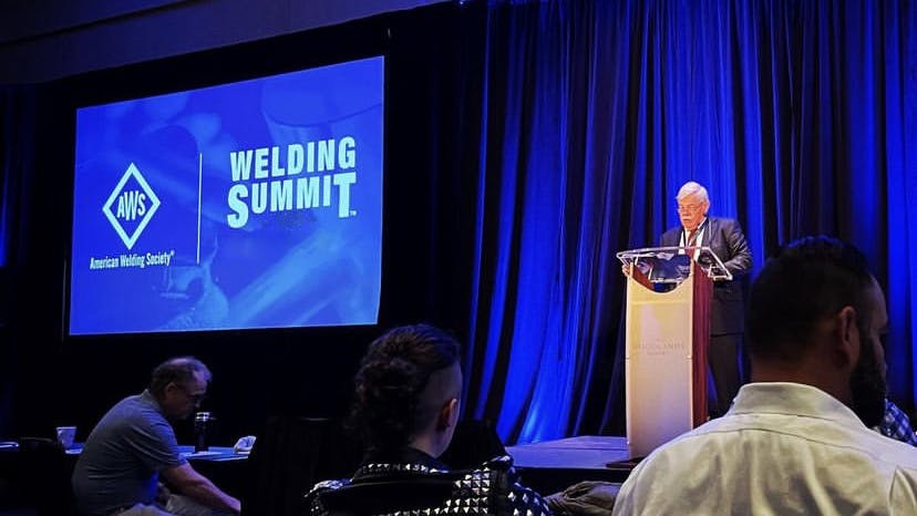 Speaker and attendees at the 2025 AWS Welding Summit.