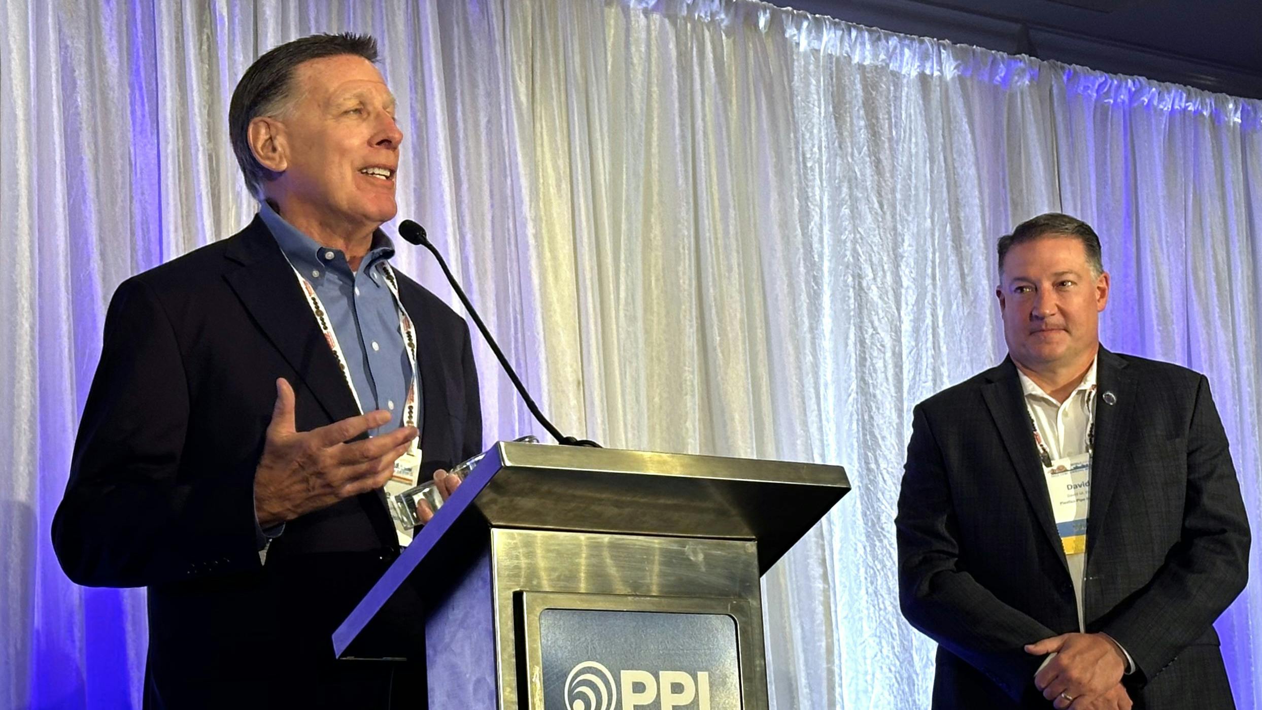 Steve Sandstrum expresses his thanks for receiving his Lifetime Achievement Award to the PPI membership during the association&rsquo;s October 2025 meeting as PPI President David Fink looks on.