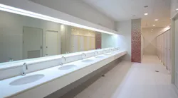 Line of sinks in a commercial restroom. Line of sinks in a commercial restroom.