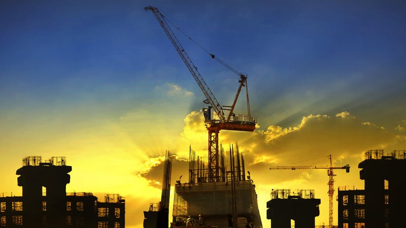 construction site against dramatic dusky sky