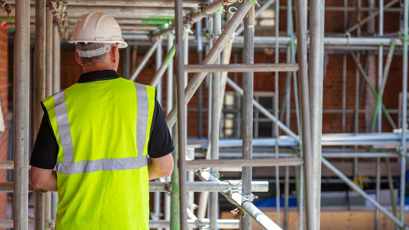 Worker on Building Site.