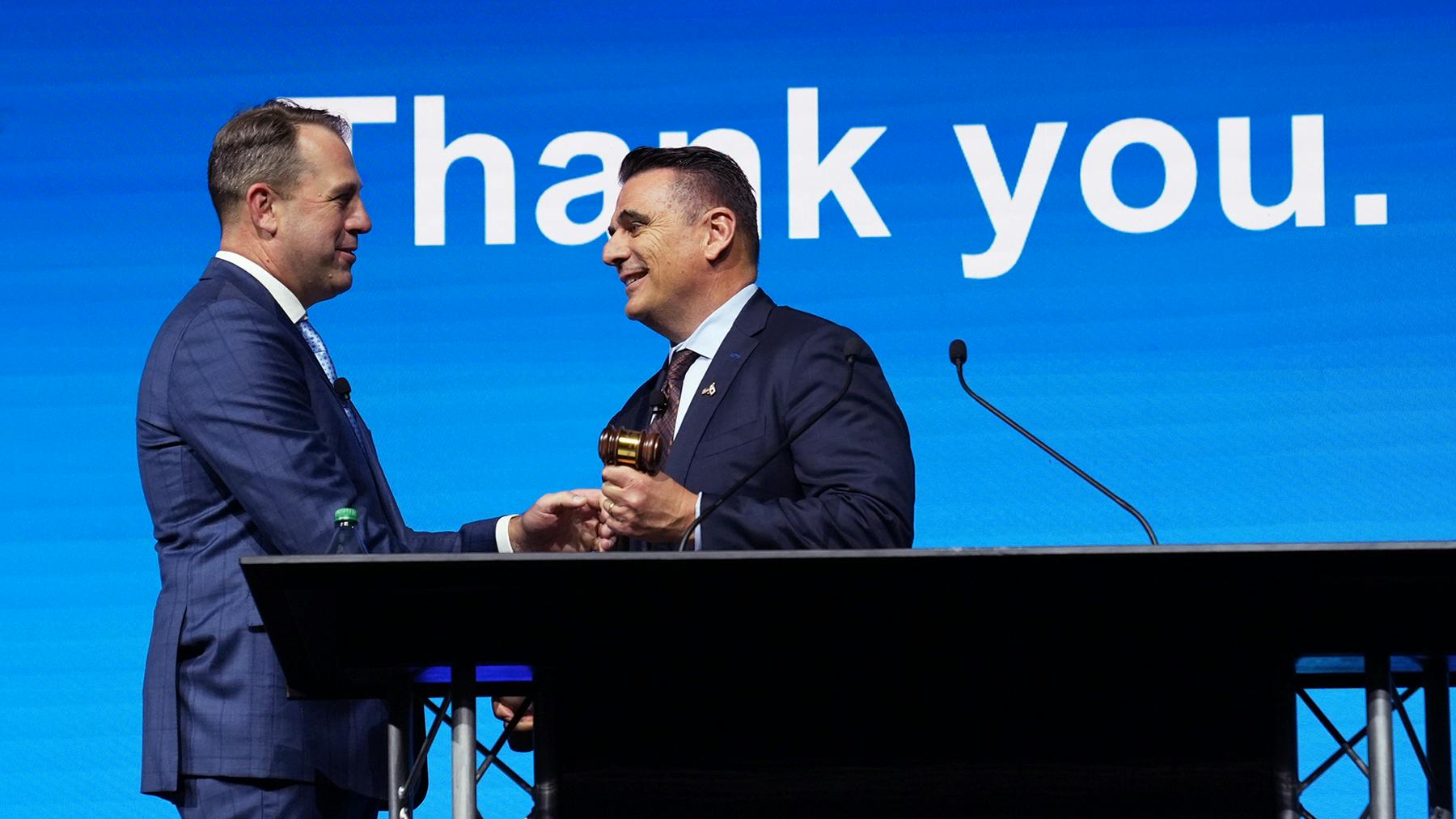 Rick Albertini, President & CEO of Phenix Truck & Van (Pomona, California), right, installed as 62nd Board chairman of NTEA