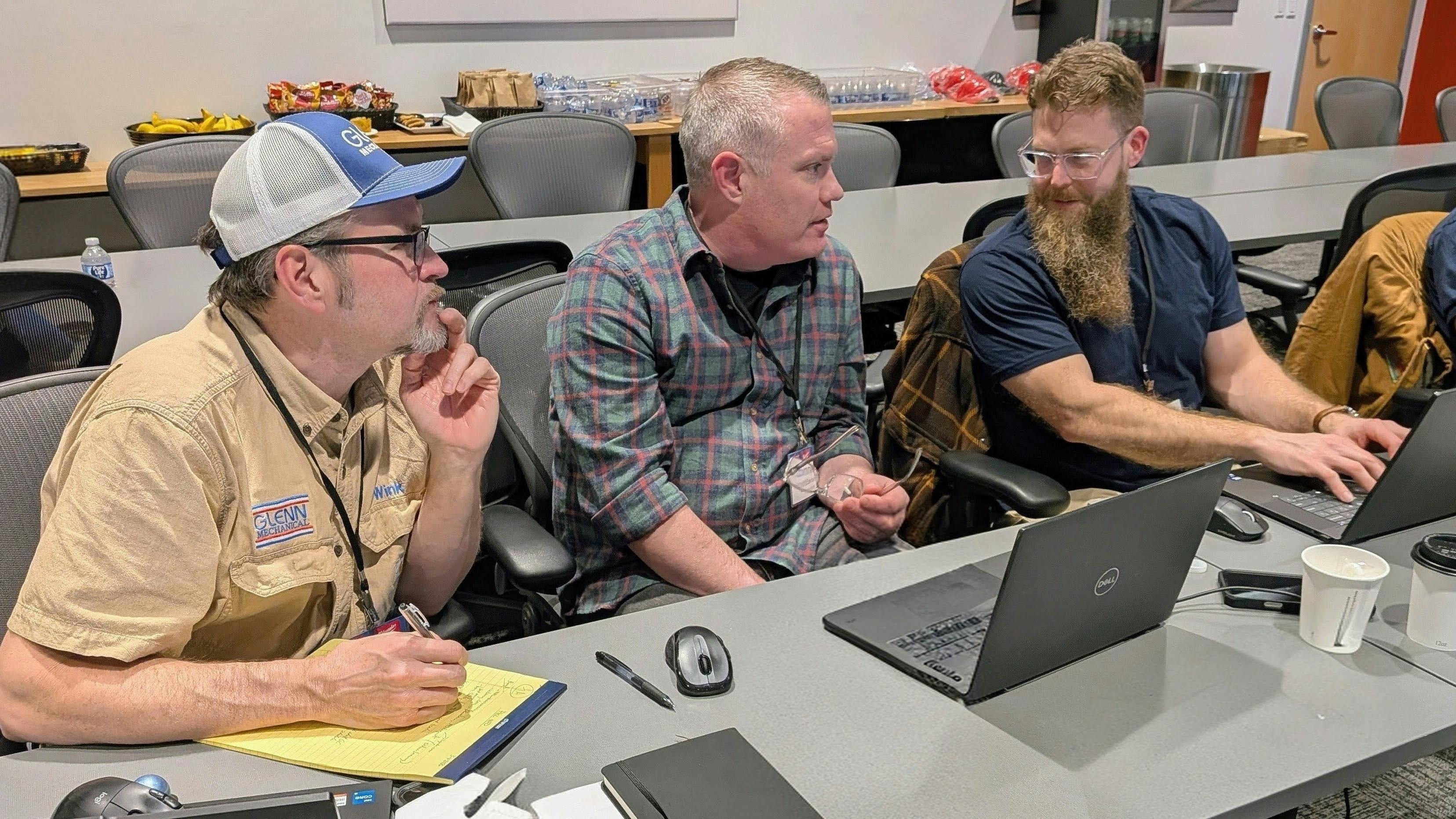 Attendees work in small groups at the 2026 PHCC Essentials of Project Management class