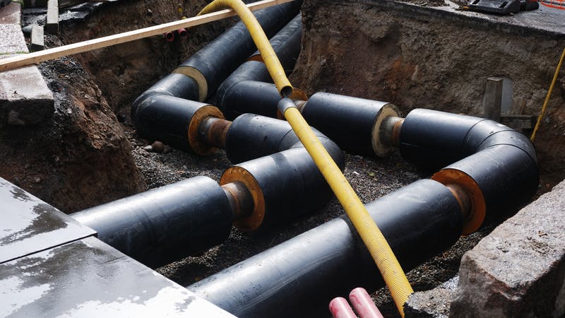 Water supply pipes in a trench.