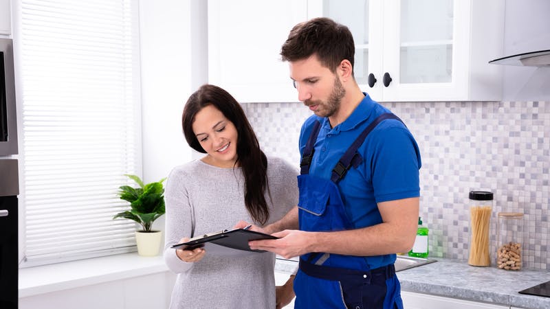 plumber explaining invoice