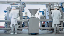 1660317237270 Twoworkersatafoodproductionline 1660317237270 Twoworkersatafoodproductionline