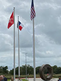 flags-and-statue-hero flags-and-statue-hero