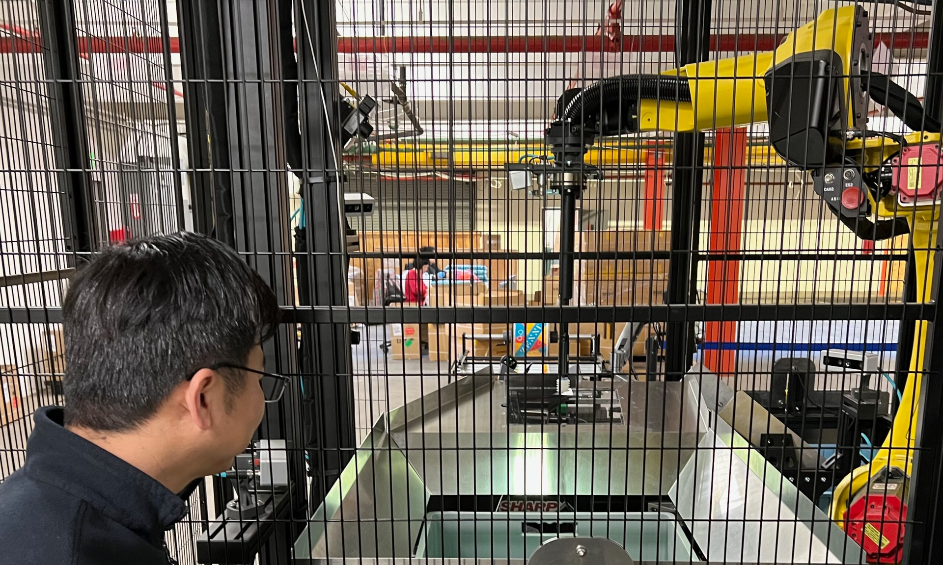 By integrating Cognex DataMan fixed-mount, image-based barcode readers into its Osaro Robotic Bagging System, Osaro combined the system on a Fanuc robot to address a technical challenge for Zenni Optical.