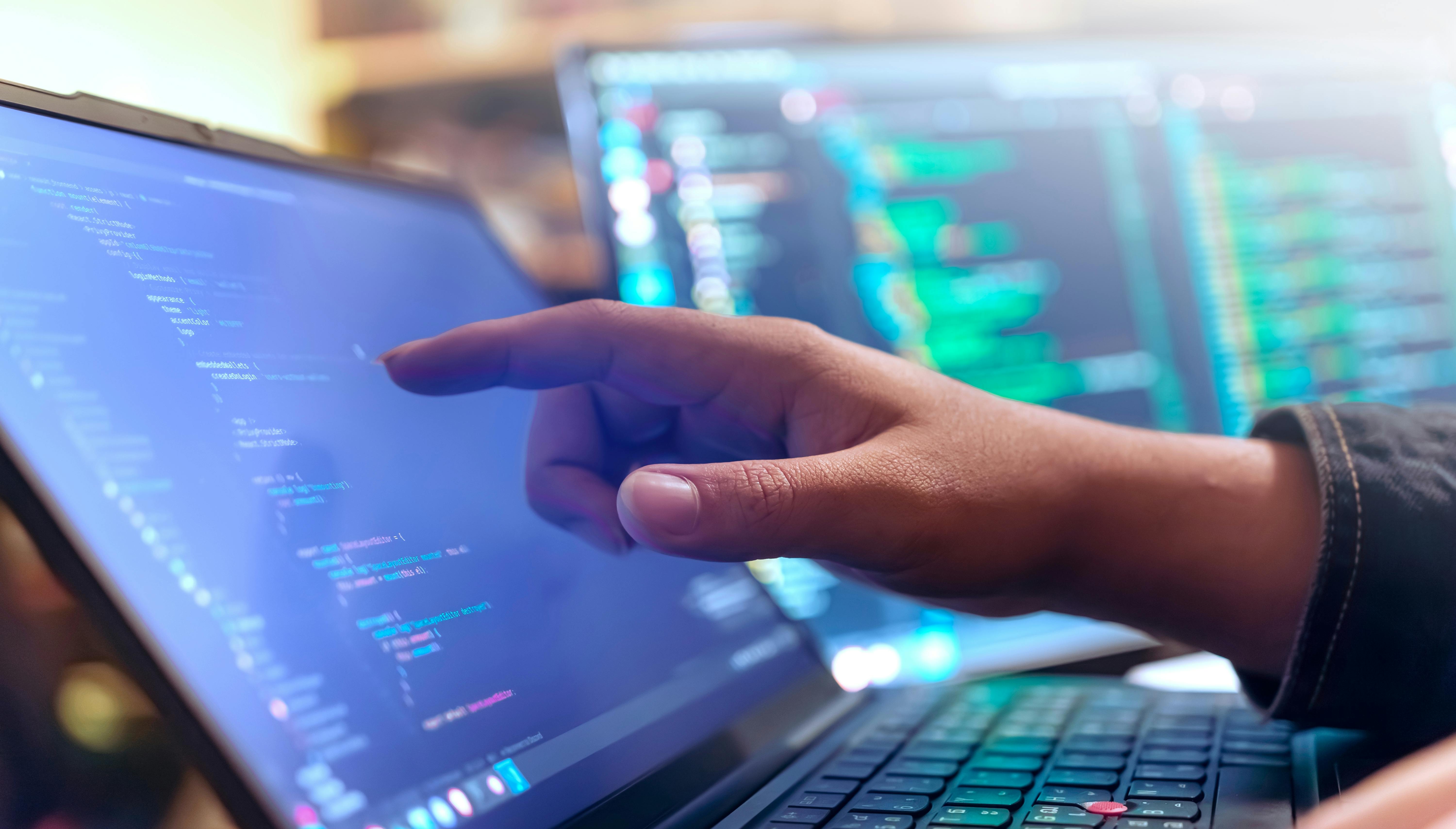 Computer engineer is typing console script code by hand