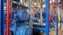 Industrial machinery. Industrial chiller installation. Industrial cooling system. Liquid supply pipe. Mechanism of air conditioning system in industry. Ammonia tube Industrial machinery. Industrial chiller installation. Industrial cooling system. Liquid supply pipe. Mechanism of air conditioning system in industry. Ammonia tube