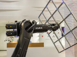 Kuka robot on Schunk assembly electronics line Kuka robot on Schunk assembly electronics line