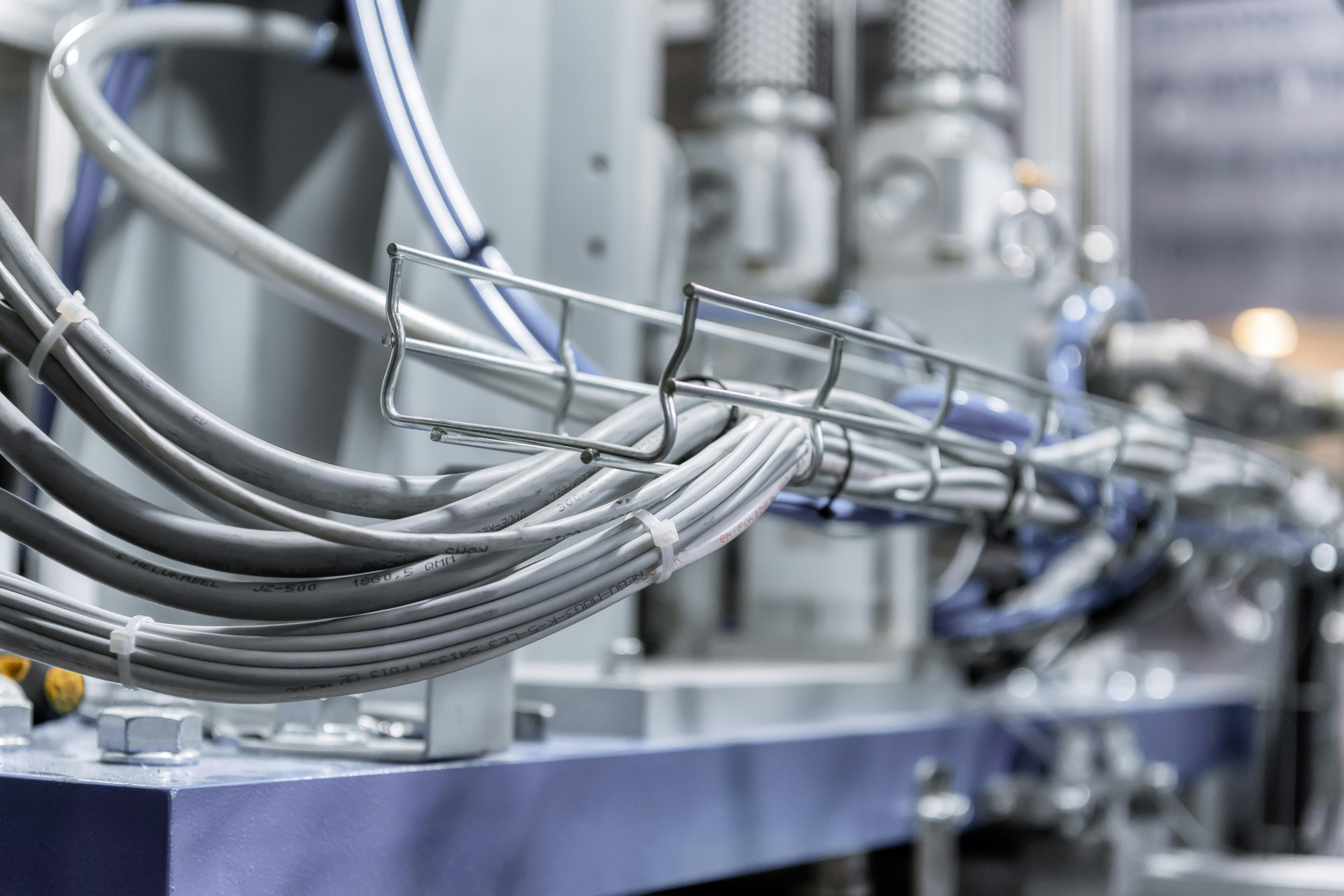Control cables of a modern downstream system. The cables are laid in the cable tray.