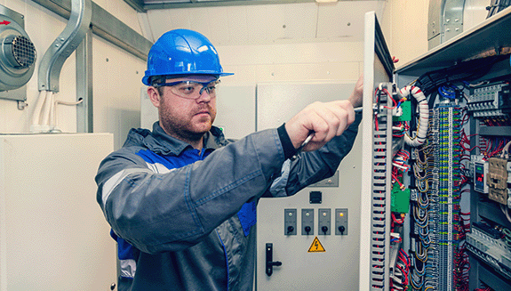 1663606655719 Imageofmanrepairingacontrolpanel