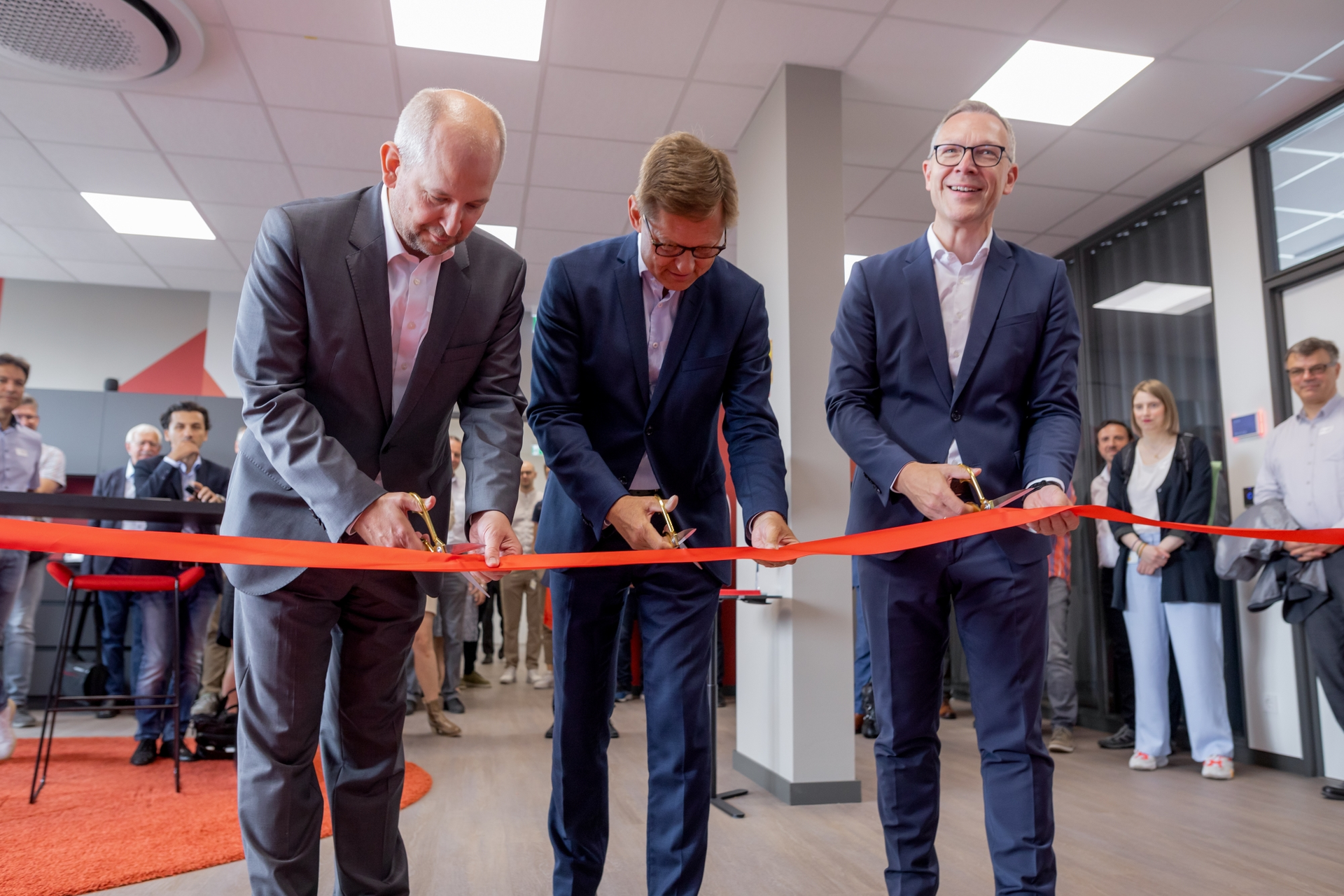 The new security lab at HIMA is inaugurated by (l. to r.) Matthias Ochs, CEO of genua, Steffen Philipp managing partner at HIMA, and J&ouml;rg de la Motte, CEO of HIMA. Source: HIMA