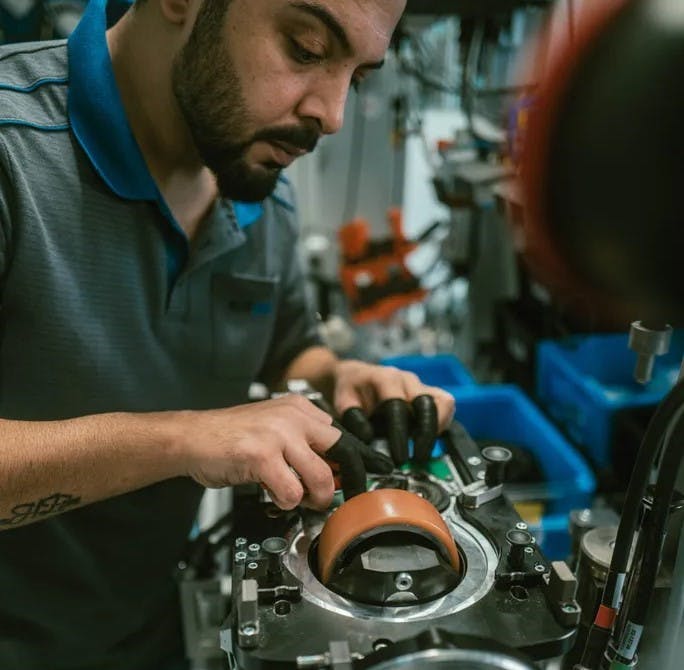 Assembly work at the ebm-pabst facility in Lauf an der Pegnitz, Germany.