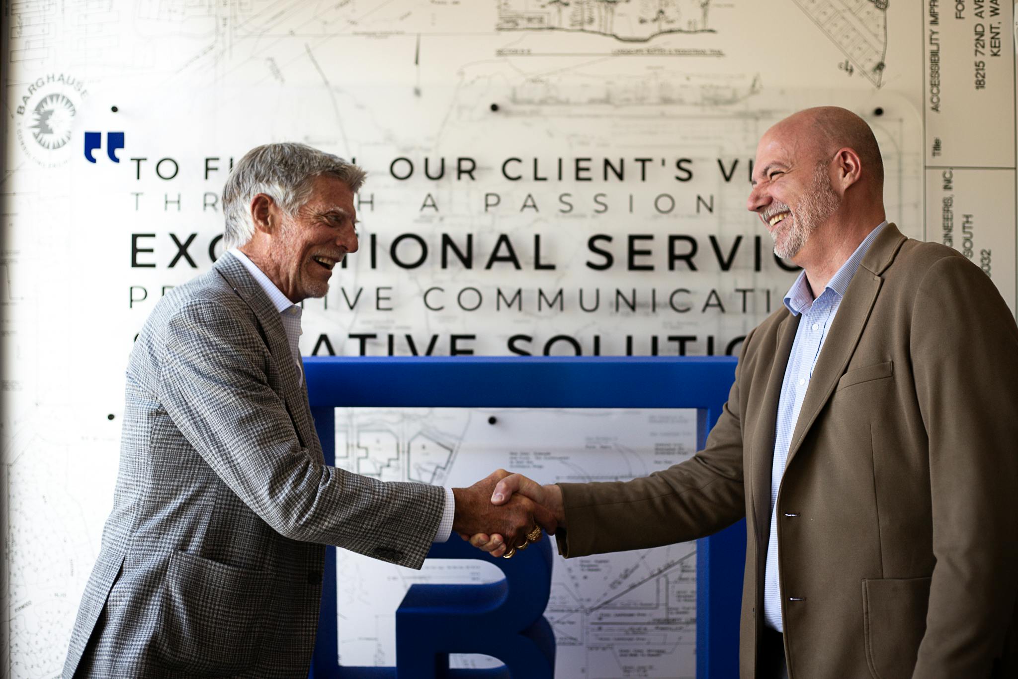 Tom Barghausen (left), founder of Barghausen Consulting Engineers Inc., with D. David Dugan, president and CEO of Core States Group (right), agree on their strategic vision for the future under the Core States Group brand.