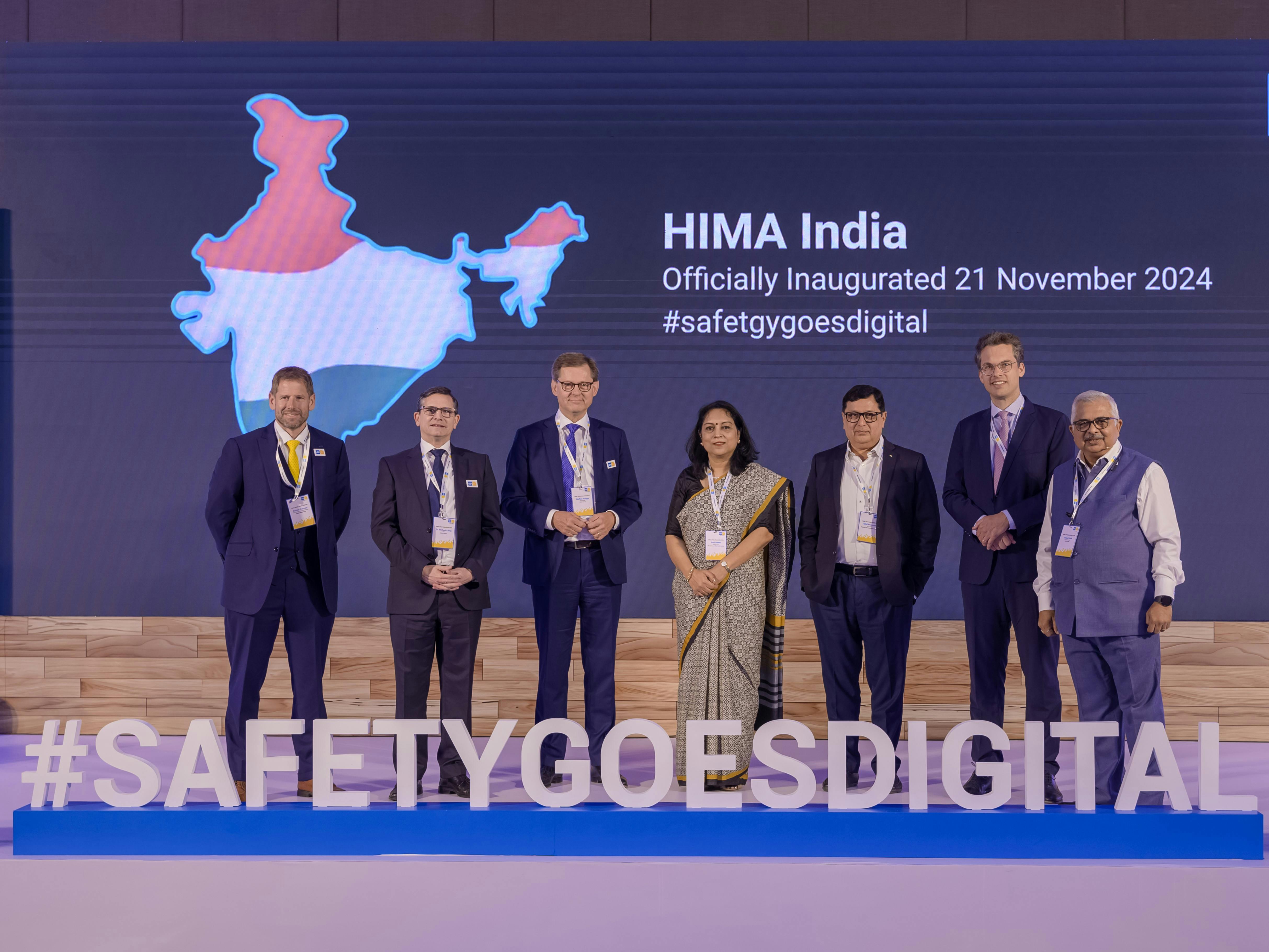 The opening of HIMA Group&rsquo;s first process and rail safety facility in India was celebrated Nov. 21 by (l. to r.) Andrew Dennant, regional VP for the Middle East at HIMA; Michael L&ouml;big, CFO at HIMA; Steffen Philipp, managing partner and shareholder at HIMA; Bani Varma, director of IS&P at Bharat Heavy Electrical Ltd.; Akhil Mehrotra, CEO and managing director at Pipeline Infrastructure Ltd; Christoph Rendtorff, deputy consul for Germany; and Deepak Naik, country manager for India at HIMA.