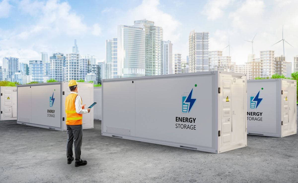 Engineer control energy storage system or battery container unit with cityscape background