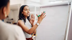 Woman, mentor and whiteboard in office for training, teaching and learning for skill or career development Woman, mentor and whiteboard in office for training, teaching and learning for skill or career development