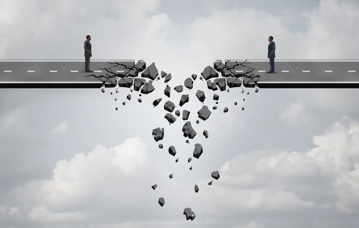 two businessmen on a road bridge that is breaking down and disconnecting