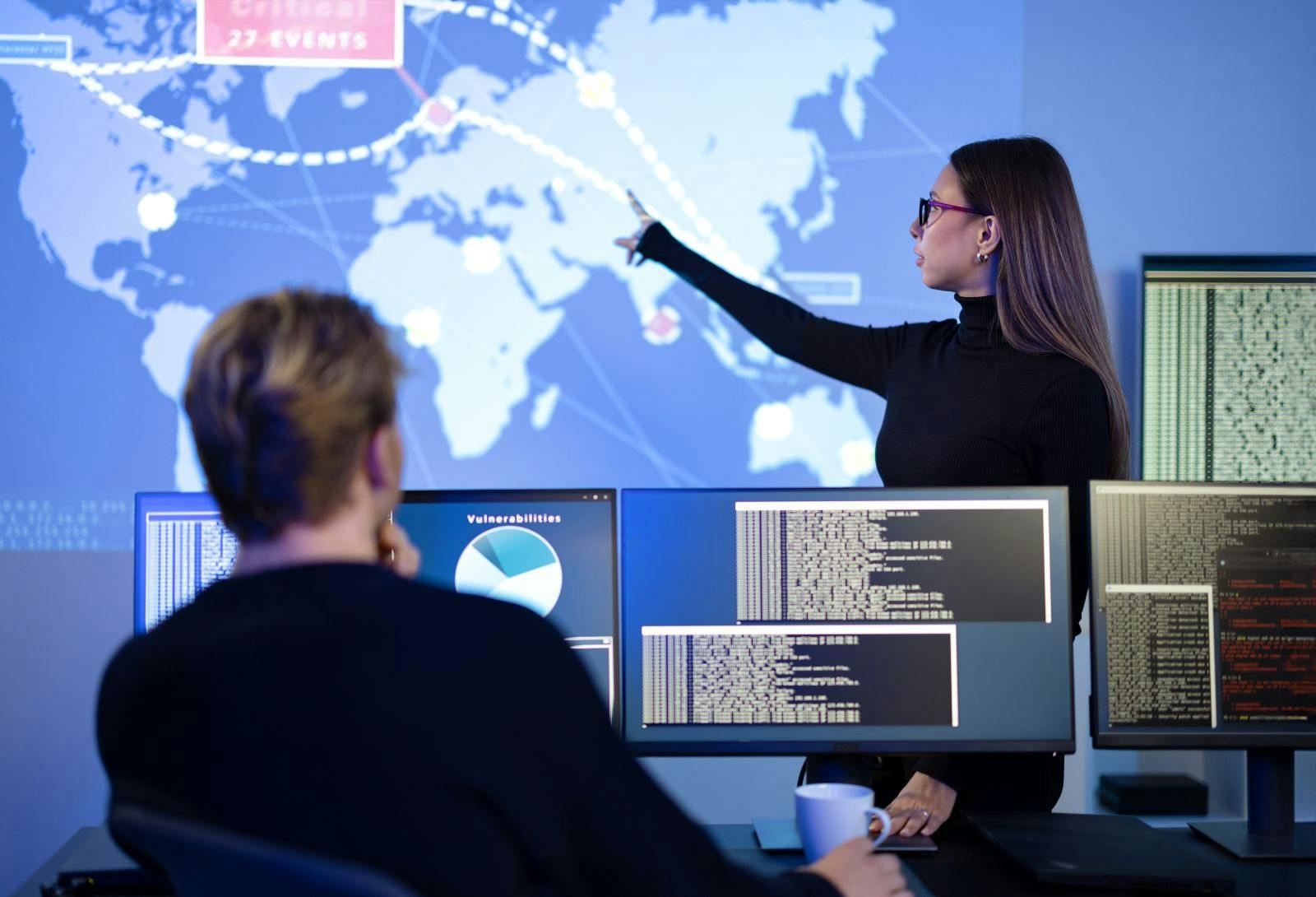 Professional cybersecurity team working to prevent security threats, find vulnerability and solve incidents