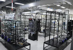 Figure 1: The 32-ft, propylene glycol distillation and recycling unit at LyondellBasell’s Center for Petrochemical Energy & Technology (CPET) at San Jacinto College in Pasadena, Texas, includes an eight tray column, DeltaV DCS, cooling water, boiler and reverse osmosis utilities, and 72 I/O with smart Rosemount transmitters. CPET’s glass pilot plant has two tank farms, feeding four process units, and all-glass and -acrylic components for easier observation. Figure 1: The 32-ft, propylene glycol distillation and recycling unit at LyondellBasell’s Center for Petrochemical Energy & Technology (CPET) at San Jacinto College in Pasadena, Texas, includes an eight tray column, DeltaV DCS, cooling water, boiler and reverse osmosis utilities, and 72 I/O with smart Rosemount transmitters. CPET’s glass pilot plant has two tank farms, feeding four process units, and all-glass and -acrylic components for easier observation.