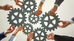 Hands from diverse individuals work together to arrange large gears on a surface, symbolizing cooperation and collective effort for success in a business environment. Hands from diverse individuals work together to arrange large gears on a surface, symbolizing cooperation and collective effort for success in a business environment.