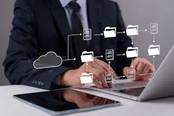 Professional managing digital documents and data flow on laptop, symbolizing cloud computing, organized file management, and efficient digital transformation for business. Professional managing digital documents and data flow on laptop, symbolizing cloud computing, organized file management, and efficient digital transformation for business.