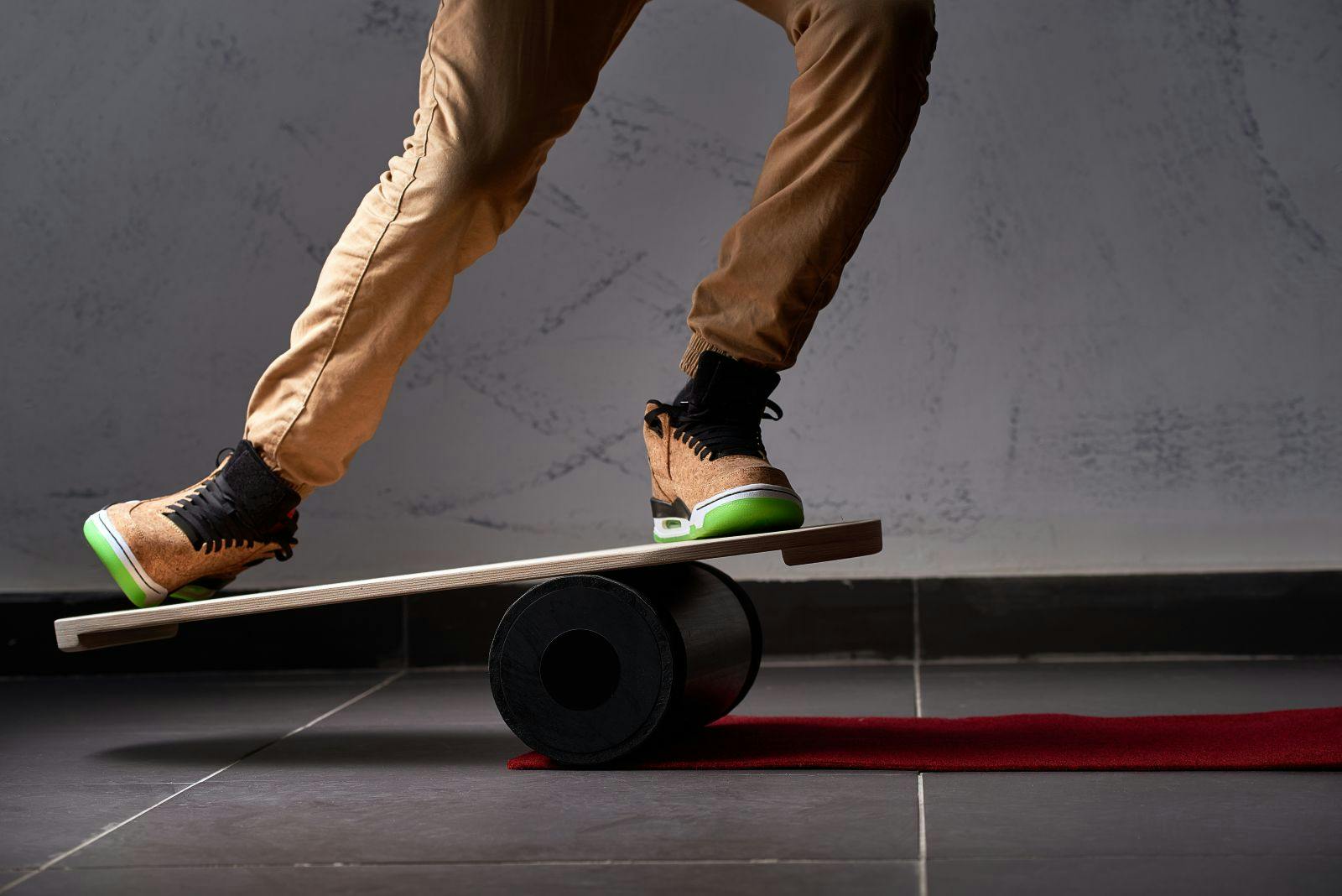 oval wooden deck for balance board. solid plastic roller for balance board. Rocker-roller boards. Isolated