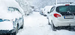 Parked car covered with snow during snow storm Parked car covered with snow during snow storm