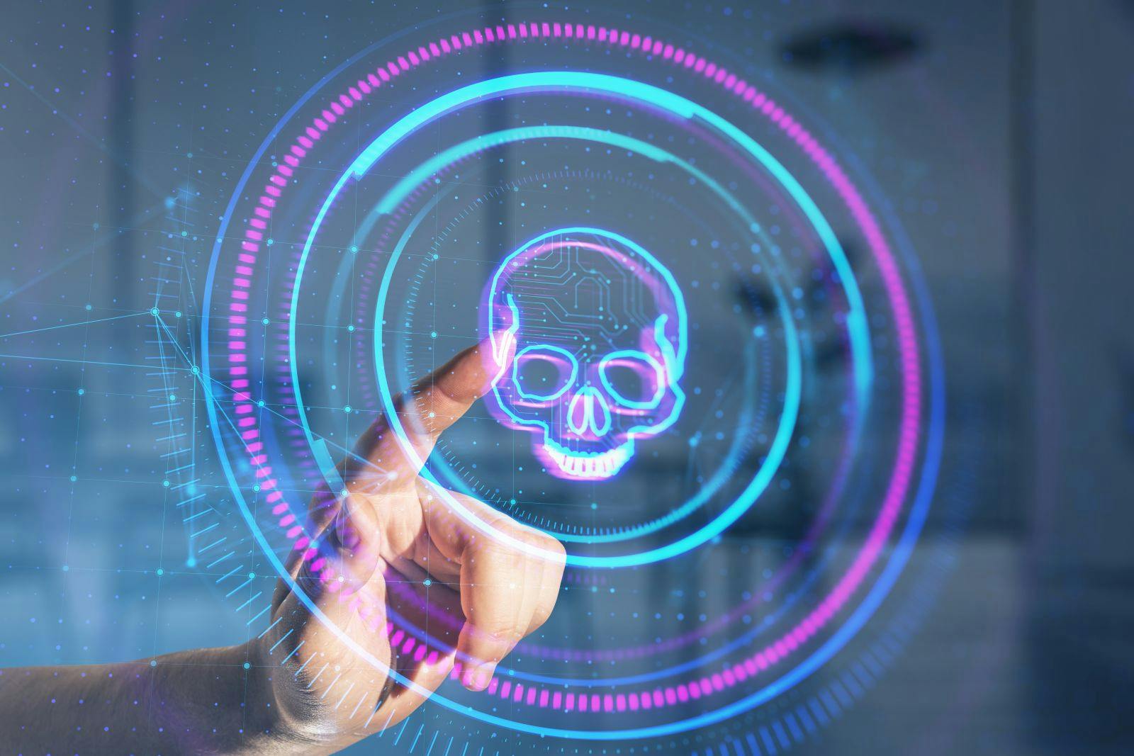 Close up of male hand pointing at creative digital round skull hologram on blurry office interior background.
