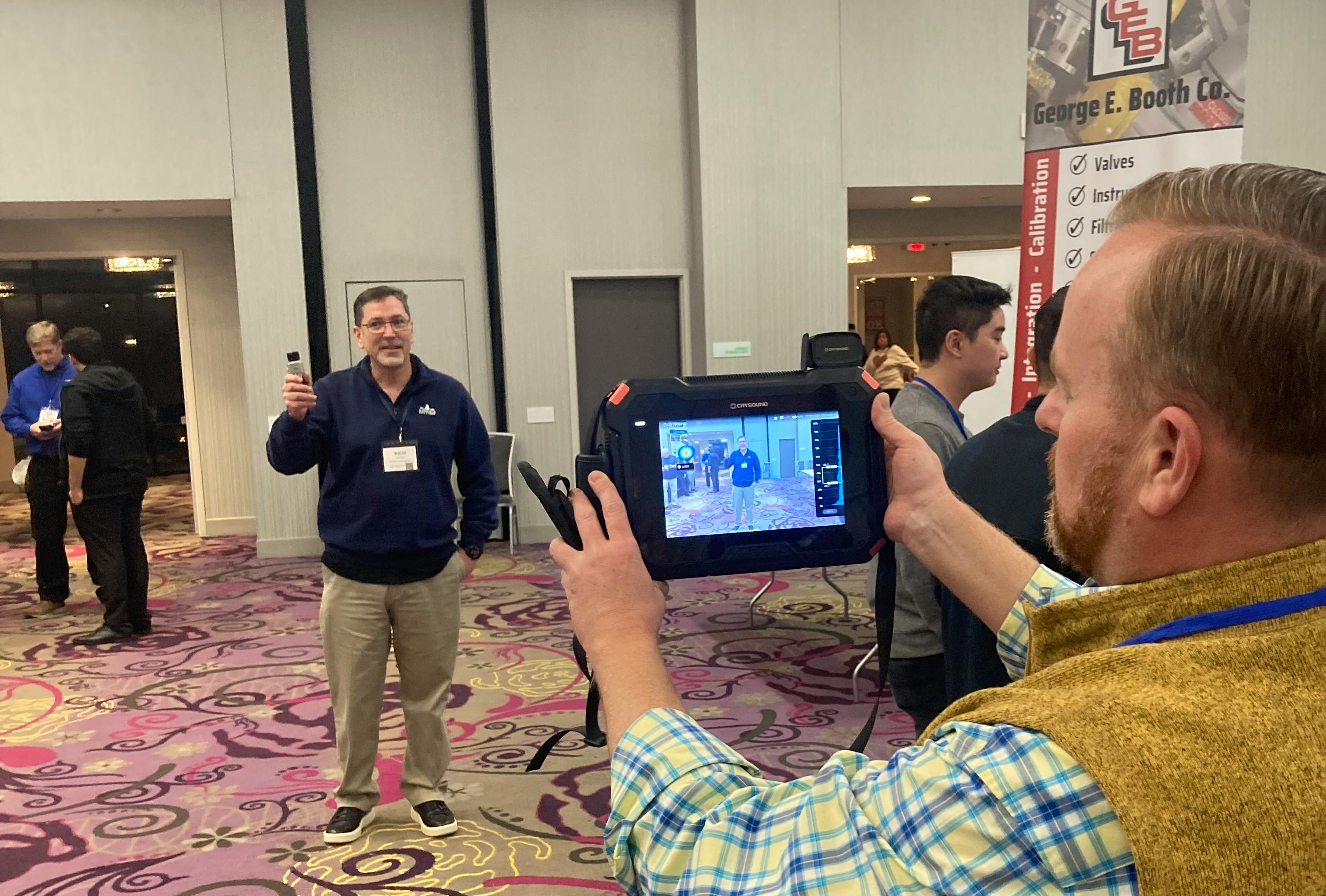 Mark Mazaraki, country manager at Crysound USA (crysound.com), shows how its handheld acoustic imager uses its ultrasonic microphone to listen for gas and vacuum leaks at U.S. distributor Hatfield and Co.&rsquo;s exhibit the ISA Will-DuPage chapter&rsquo;s annual tabletop show and technical conference on Feb. 26 at the Holiday Inn&rsquo;s Rock-Run Convention Center in Joliet, Ill. The event featured more than 35 exhibitors and six technical sessions in two tracks.