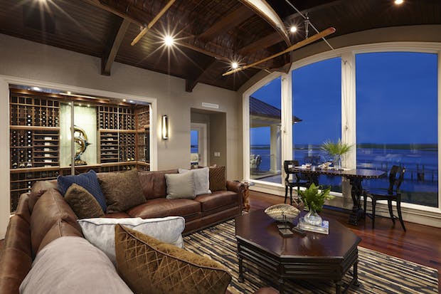 Coastal Mediterranean gathering room and wine cellar