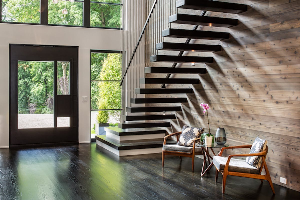 Floating stairway near front entry