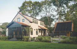 Cottage with solar array on garage in high-performance, net zero house at Jamestown, R.I. Cottage with solar array on garage in high-performance, net zero house at Jamestown, R.I.