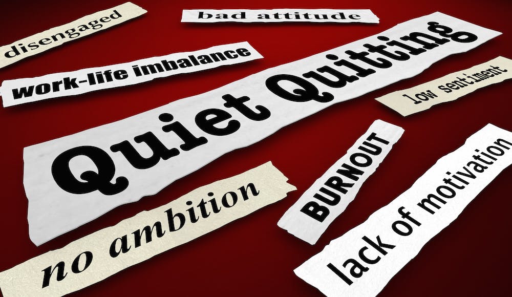 Cut-outs of words associated with quiet quitting