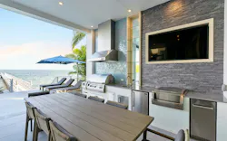 Complete outdoor kitchen of contemporary home with built-in Fire Magic Grill Complete outdoor kitchen of contemporary home with built-in Fire Magic Grill