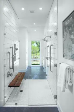 White tile shower stall with bench White tile shower stall with bench