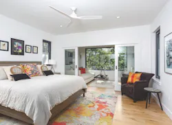 Picture window in bedroom of Cape Cod high-performance house Picture window in bedroom of Cape Cod high-performance house