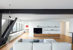 living room with steel beam intersecting ceiling living room with steel beam intersecting ceiling