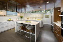 Minimalistic mid-century modern kitchen in white with clerestory windows Minimalistic mid-century modern kitchen in white with clerestory windows
