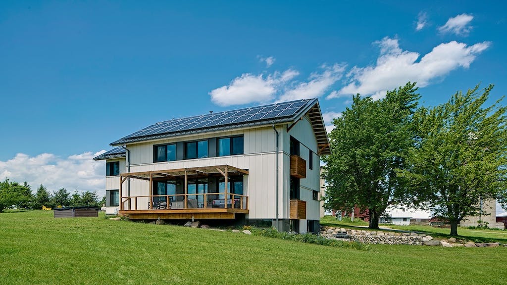 Farmhouse custom home exterior with board-and-batten siding