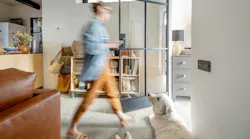 Construction concierge walking through a modern interior (blurred image) Construction concierge walking through a modern interior (blurred image)