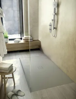 This one-piece mineral composite shower base can be recessed into the floor for a zero-barrier installation. This one-piece mineral composite shower base can be recessed into the floor for a zero-barrier installation.