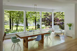 The dining room’s generous windows open the interior to Sodon Lake, one of Michigan’s few dichothermic lakes. The dining room’s generous windows open the interior to Sodon Lake, one of Michigan’s few dichothermic lakes.