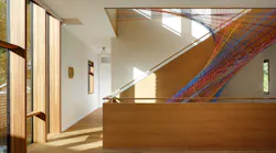 After adding a unique rainbow netting, this staircase became the centerpiece of this 8,500-square-foot custom home. After adding a unique rainbow netting, this staircase became the centerpiece of this 8,500-square-foot custom home.
