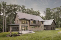 South-side orientation of a passive house, showing an abundance of windows meant to capture passive solar energy South-side orientation of a passive house, showing an abundance of windows meant to capture passive solar energy