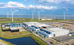 The Google data center campus at Eemshaven in the Netherlands, with nearby wind turbines in the background. (Photo: Google) The Google data center campus at Eemshaven in the Netherlands, with nearby wind turbines in the background. (Photo: Google)