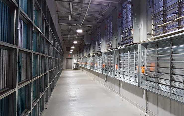 The cooling &ldquo;penthouse&rdquo; design of a Facebook data center in Prineville, Oregon. Servers are cooled with fresh air that enters through the louvers on the right, reducing the need for use of water and electricity. (Photo: Rich Miller)