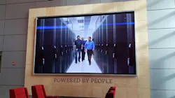 Data centers are powered by people. A video screen in the lobby of the QTS Data Centers facility in Ashburn, Va. (Photo: Rich Miller) Data centers are powered by people. A video screen in the lobby of the QTS Data Centers facility in Ashburn, Va. (Photo: Rich Miller)